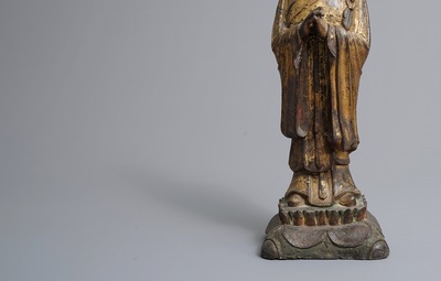 A large Chinese gilt bronze figure of Mahakasyapa, Ming