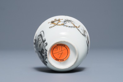 Une tasse et soucoupe armori&eacute; en porcelaine de Chine grisaille et dor&eacute;, Qianlong