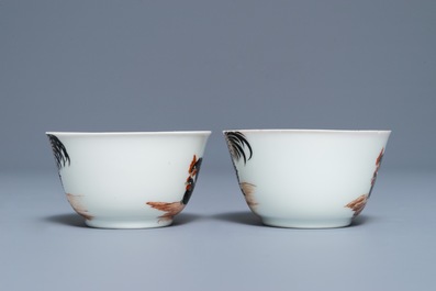 A pair of fine Chinese cups and saucers with roosters and chickens, Qianlong