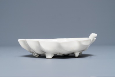 A Chinese Dehua blanc de Chine leaf-shaped brush washer, Kangxi
