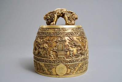 A Chinese gilt bronze bell in zitan suspension frame, Qianlong mark, 18/19th C.