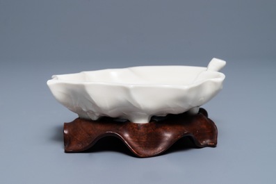 A Chinese Dehua blanc de Chine leaf-shaped brush washer, Kangxi