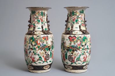 A pair of Chinese Nanking famille rose vases and a bowl, 19th C.