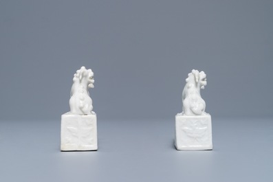 A pair of Chinese Dehua blanc de Chine scroll weights, Kangxi