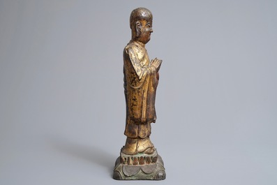 A large Chinese gilt bronze figure of Mahakasyapa, Ming