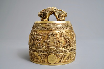 A Chinese gilt bronze bell in zitan suspension frame, Qianlong mark, 18/19th C.