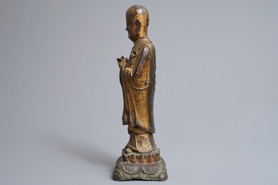 A large Chinese gilt bronze figure of Mahakasyapa, Ming