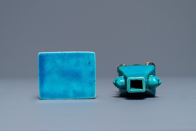 A Chinese turquoise and aubergine-glazed miniature vase on stand and a table, Kangxi