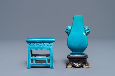 A Chinese turquoise and aubergine-glazed miniature vase on stand and a table, Kangxi