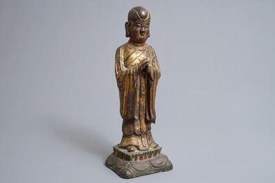 A large Chinese gilt bronze figure of Mahakasyapa, Ming