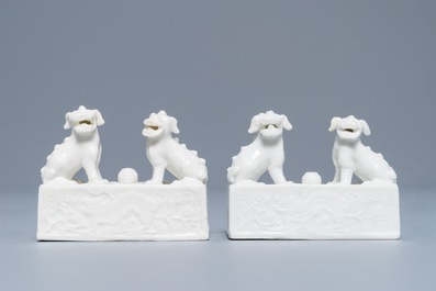 A pair of Chinese Dehua blanc de Chine scroll weights, Kangxi