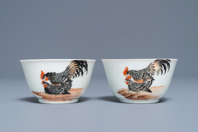 A pair of fine Chinese cups and saucers with roosters and chickens, Qianlong