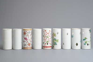 Nine Chinese famille rose and qianjiang cai hat stands, 19/20th C.