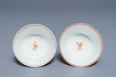 A pair of fine Chinese cups and saucers with roosters and chickens, Qianlong