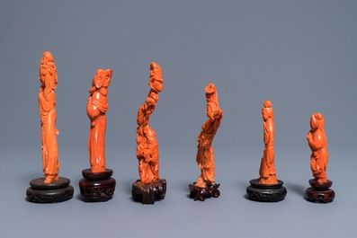 Six Chinese carved coral figures on wooden stands, 19/20th C.