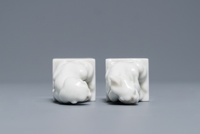 A pair of Chinese Dehua blanc de Chine seals with lions, impressed sealmarks, Kangxi