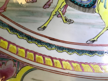 A massive Chinese famille rose 'horseriders' dish, Yongzheng