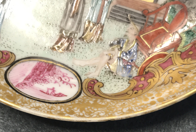 A fine Chinese famille rose 'mandarin' cup and saucer, Yongzheng/Qianlong