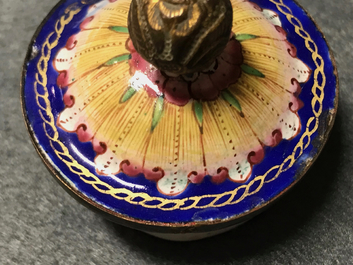 A Chinese Canton enamel teapot with floral design, 18/19th C.