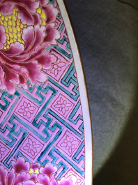 A massive Chinese famille rose 'horseriders' dish, Yongzheng