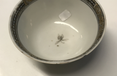 A Chinese famille rose erotical subject cup and saucer, Yongzheng