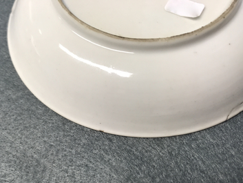 A fine Chinese famille rose 'mandarin' cup and saucer, Yongzheng/Qianlong