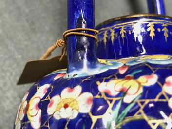 A Chinese Canton enamel teapot with floral design, 18/19th C.