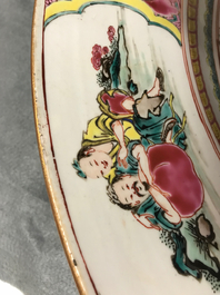 A massive Chinese famille rose 'horseriders' dish, Yongzheng