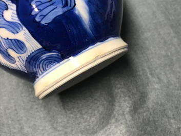 A Chinese blue and white 'mythical beasts' vase and cover, Kangxi
