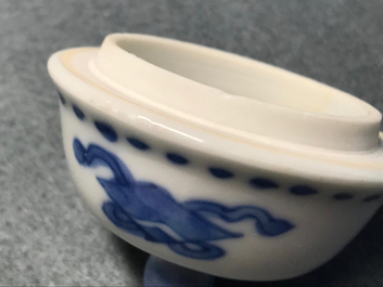 A Chinese blue and white ewer and cover with 'antiquities' design, Kangxi