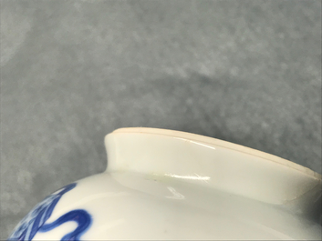 A Chinese blue and white ewer and cover with 'antiquities' design, Kangxi