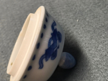 A Chinese blue and white ewer and cover with 'antiquities' design, Kangxi