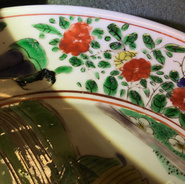 A Chinese famille verte plate with a lady and her cat, Kangxi