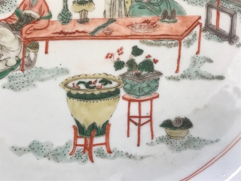 A Chinese famille verte dish with ladies in a garden, Kangxi