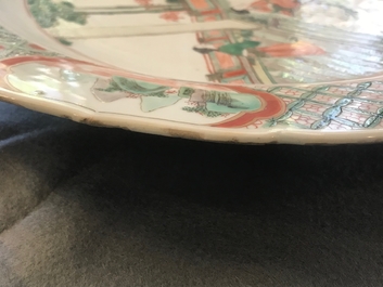 A Chinese famille verte dish with ladies in a garden, Kangxi