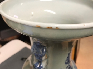 A pair of Chinese blue and white celadon ground vases with dragons and phoenixes, 19th C.
