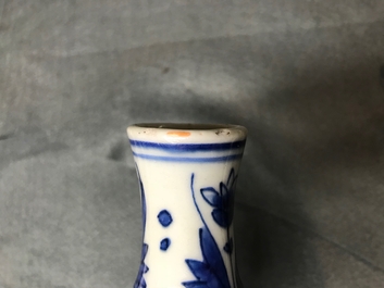 A Chinese blue and white double gourd vase with figures in a landscape, Transitional period