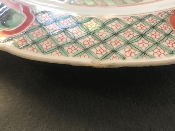 A Chinese famille verte dish with ladies in a garden, Kangxi