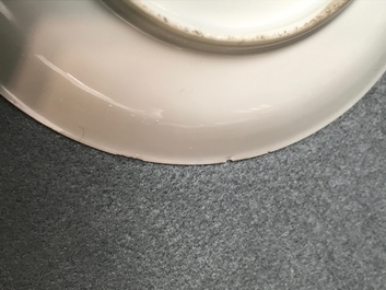 A fine Chinese famille rose saucer plate with armorial and floral design, Yongzheng