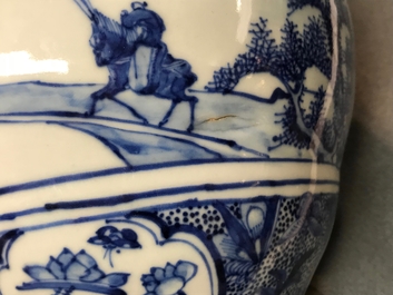 A Chinese blue and white vase with figures in a landscape, 19th C.