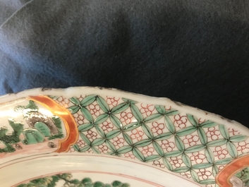 A Chinese famille verte dish with ladies in a garden, Kangxi