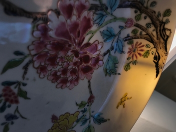 A fine Chinese famille rose plate with a bird among flowers, Yongzheng
