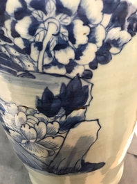 A pair of Chinese blue and white celadon ground vases with dragons and phoenixes, 19th C.