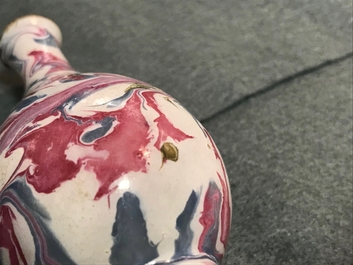 An unusual small Chinese faux-marbre-glazed vase, 18th C.