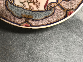 A fine Chinese famille rose saucer plate with armorial and floral design, Yongzheng