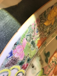 A fine Chinese famille rose dish with figures in a garden, Yongzheng