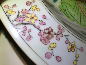 A fine Chinese famille rose dish with figures in a garden, Yongzheng
