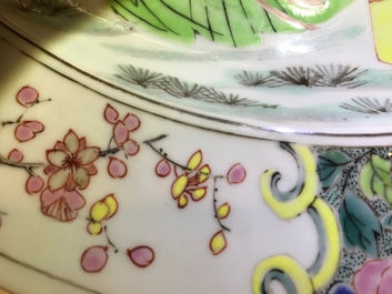 A fine Chinese famille rose dish with figures in a garden, Yongzheng