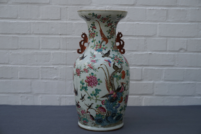 A Chinese famille rose 'phoenixes and pheasants' vase, 19th C.