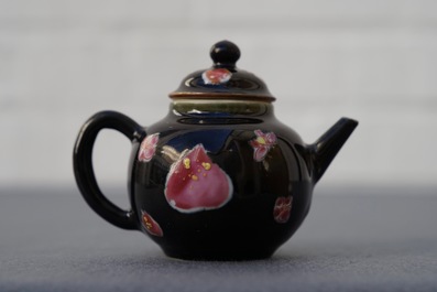 A small Chinese famille rose black ground teapot and cover, Yongzheng/Qianlong